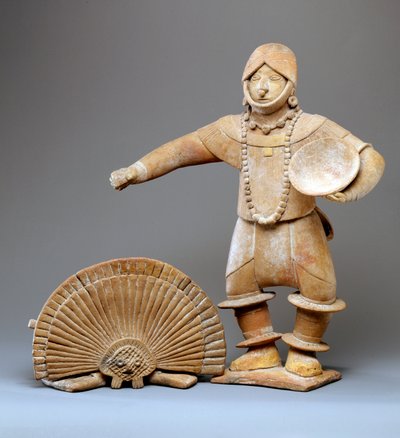 Dancer with headdress by Mesoamerican